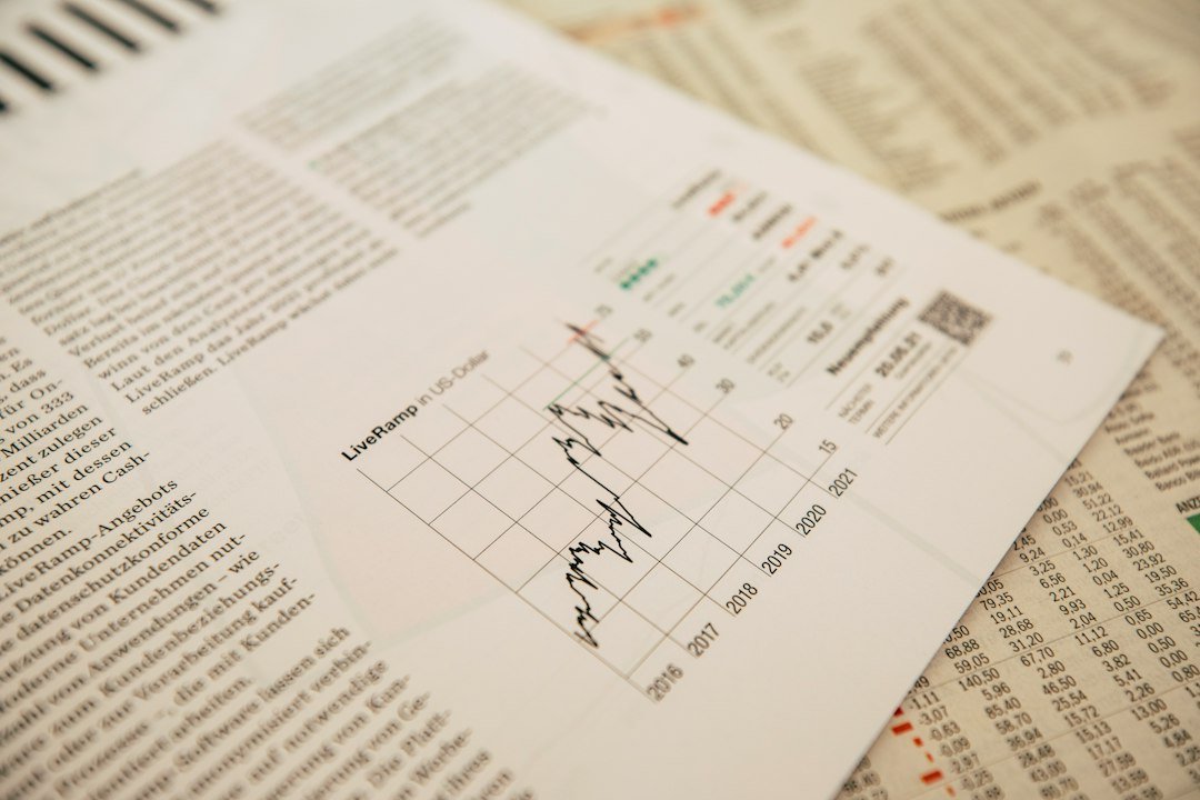 Financial newspaper with a stock chart