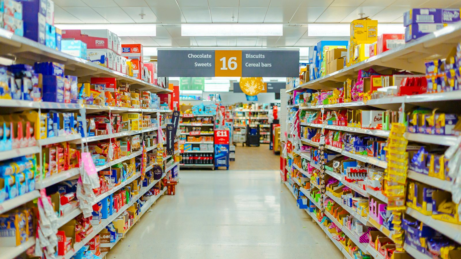 Supermarket aisle filled with packaged food products